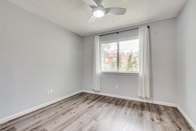 Empty room featuring ceiling fan and light hardwood / wood-style flooring | Image 22