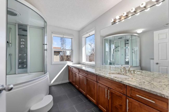 213 West Creek Drive, Home with 4 bedrooms, 3 bathrooms and 4 parking in Chestermere AB | Image 22