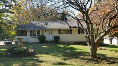 Ranch-style house on large corner lot property. | Image 1