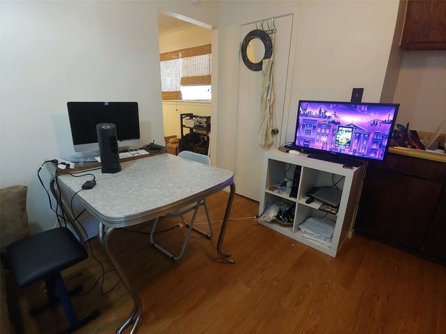 Office space with wood finished floors | Image 7