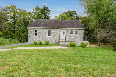 View of front facade featuring a front lawn | Image 2