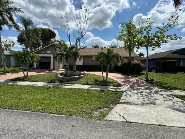 10404 Carmen Lane, House other with 4 bedrooms, 2 bathrooms and null parking in Royal Palm Beach FL | Image 1