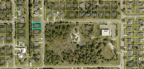 727 Long Distance Ln, Lehigh Acres, FL, 33974-9523 | Card Image