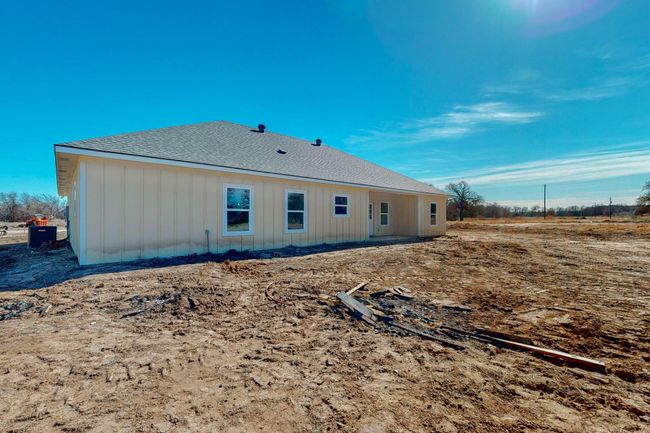 Rear view of house with roof with shingles | Image 8