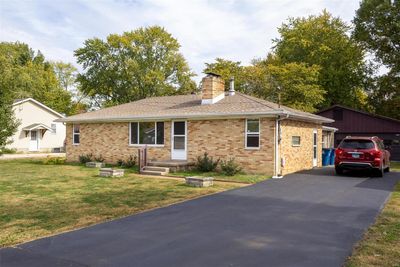 Single story home featuring a front yard | Image 1