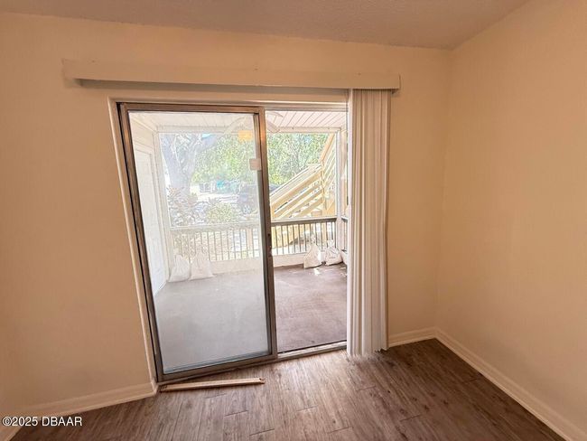 sliding door acces to the screened porch | Image 63