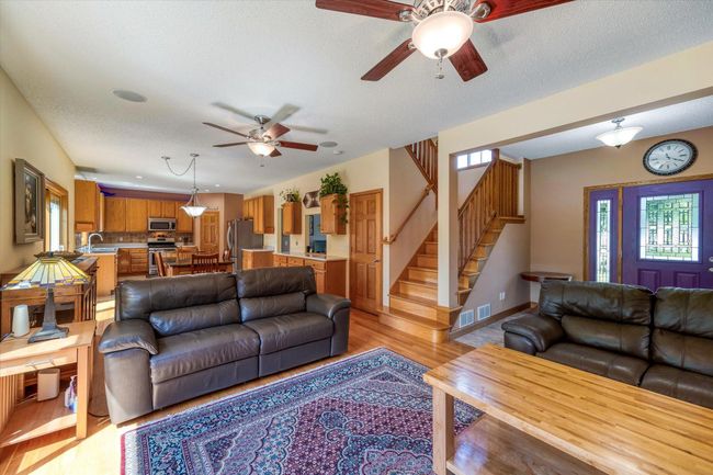 The open main level has oak hardwood floors throughout | Image 5