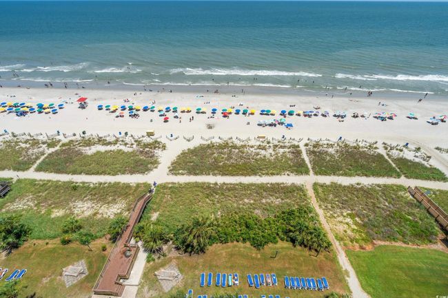Aerial view of waterfront with a beach | Image 22