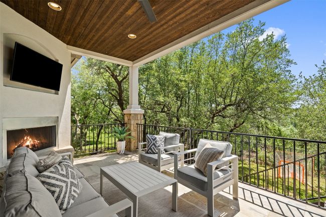 View of patio / terrace with an outdoor living space with a fireplace | Image 33