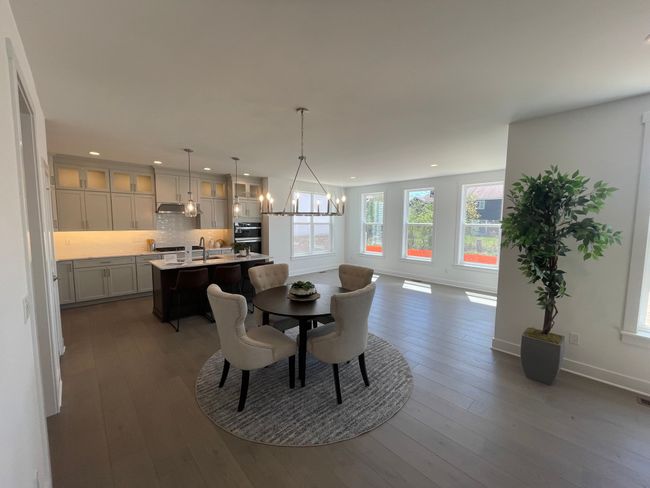 Kitchen opens to casual dining area & conservatory | Image 8