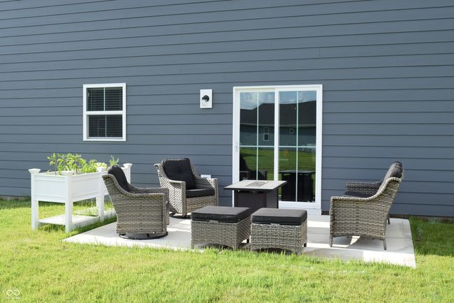 upgraded patio of home located just off of dining area | Image 8