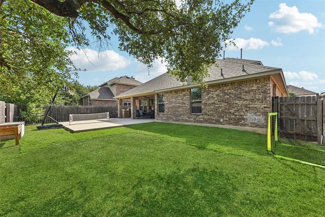 The backyard offers a wide-open canvas, whether you're envisioning a garden, playscape, or just room to roam *Virtual green grass | Image 34