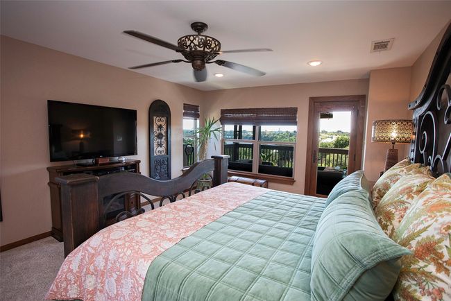 Bedroom featuring access to exterior, carpet floors, recessed lighting, and ceiling fan | Image 12