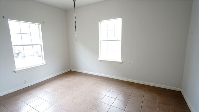 This is 1 of the 2 bedrooms in the 5504 Texas one-story standalone unit. | Image 11