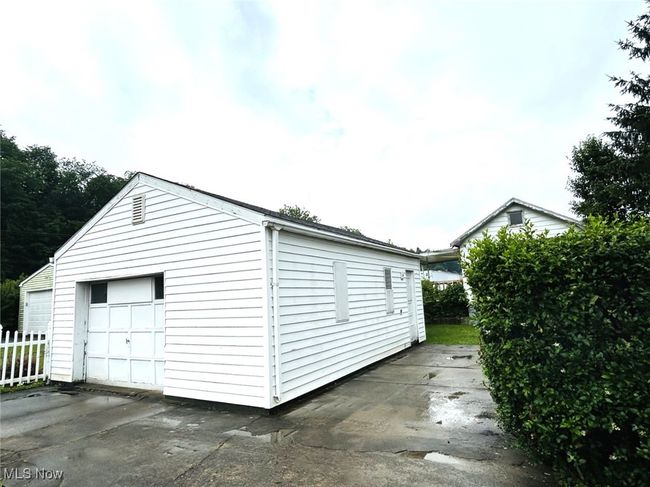 Detached garage featuring driveway | Image 19