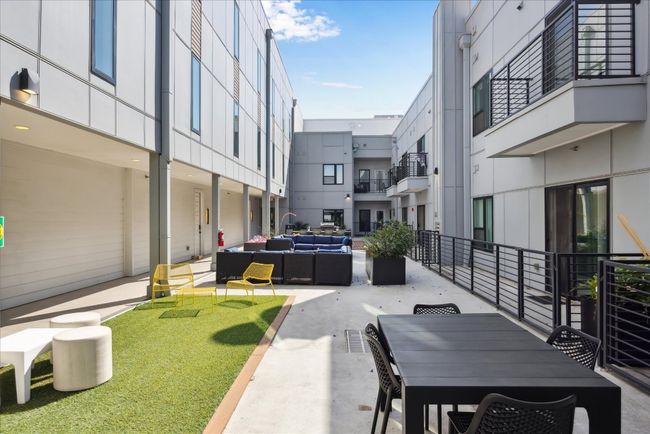 Resident courtyard with grilling station and lounge seating and outdoor dining | Image 15