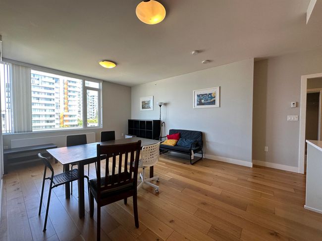 Dining space with wood-type flooring and baseboards | Image 18