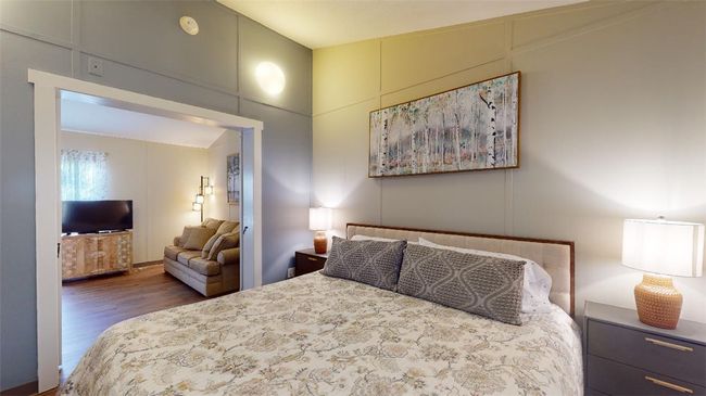 Bedroom featuring wood finished floors | Image 23