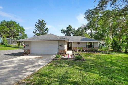 235 W Retta St, DE LEON SPRINGS, FL, 32130-3079 | Card Image