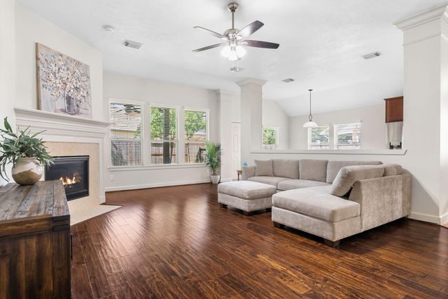 Open concept Living area with fireplace. | Image 11