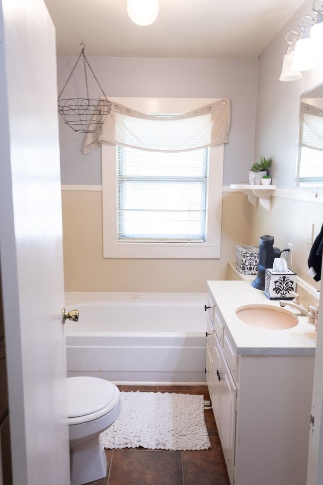 Bathroom featuring vanity, a bath, and tile patterned floors | Image 13