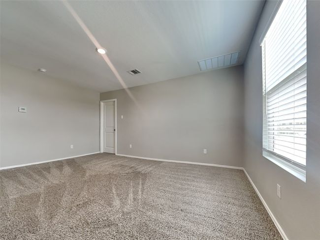 Spare room with carpet floors and baseboards | Image 13