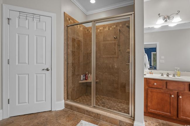 Full bathroom featuring ornamental molding, a shower stall, and vanity | Image 27