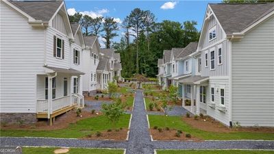 View of side of home featuring a lawn | Image 2