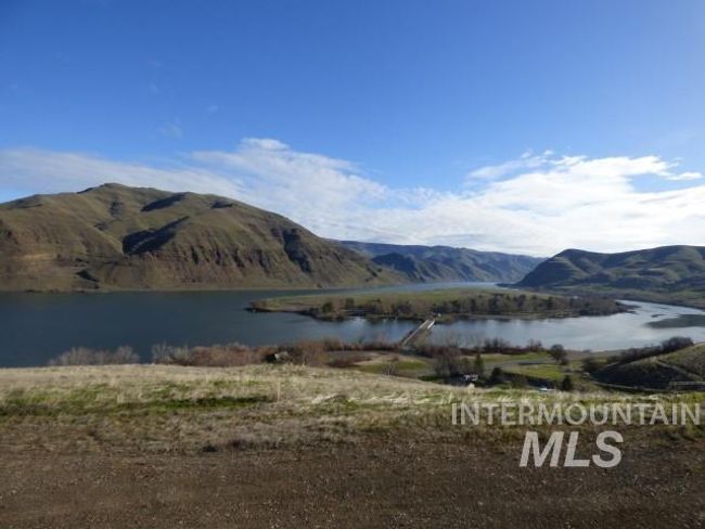 Mountain view with a large body of water | Image 28