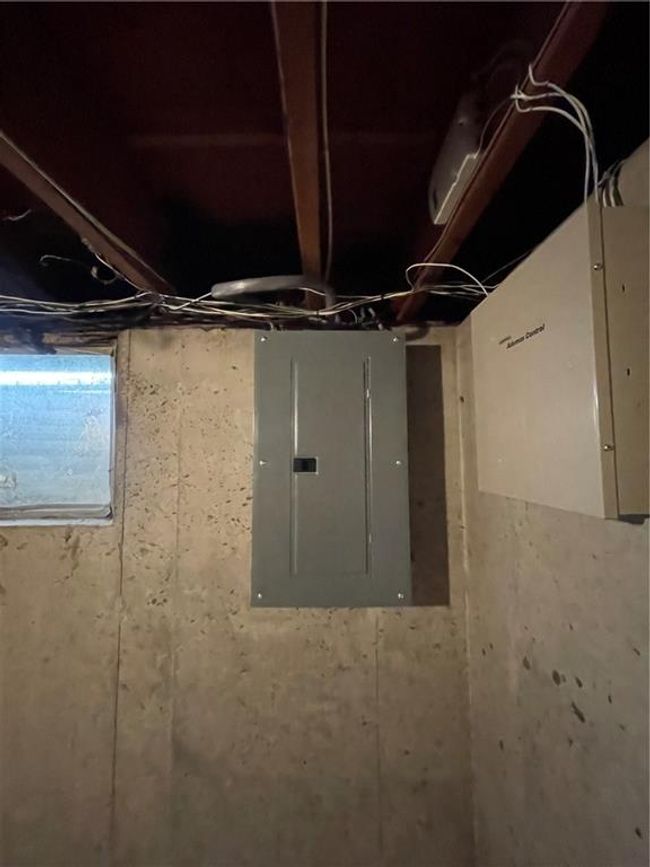 Below grade area featuring electric panel | Image 32