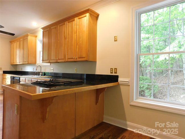 Bar area offers extra seating. | Image 14