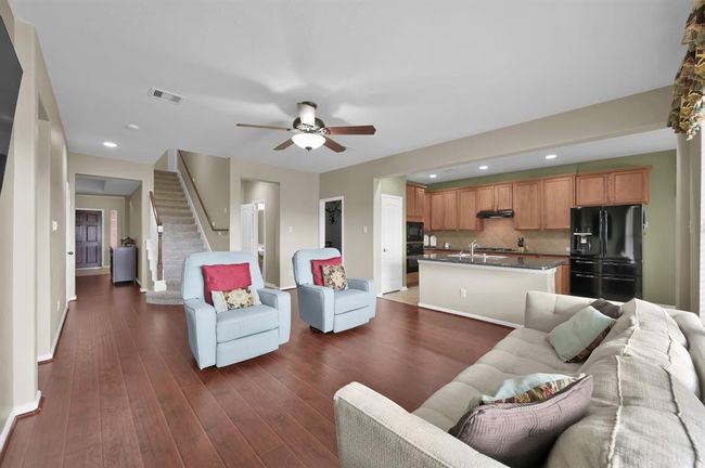 Open concept living and kitchen area. | Image 10