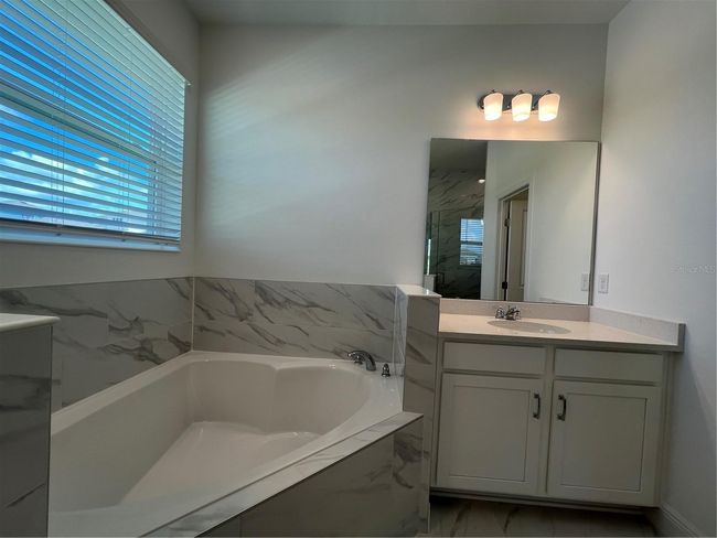 2137 Sunshine Peak Dr, House other with 4 bedrooms, 4 bathrooms and null parking in MINNEOLA FL | Image 21