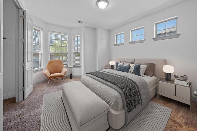 Bedroom with baseboards, visible vents, and carpet | Image 11