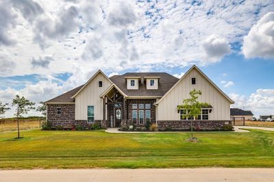 View of front of home with a front lawn | Image 1