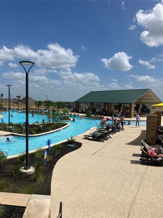 Community pool with a patio area | Image 33