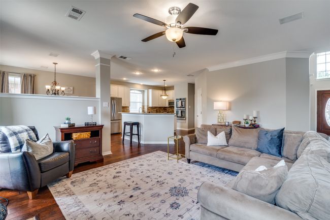 Open to the kitchen, this is a great space for entertaining. | Image 10