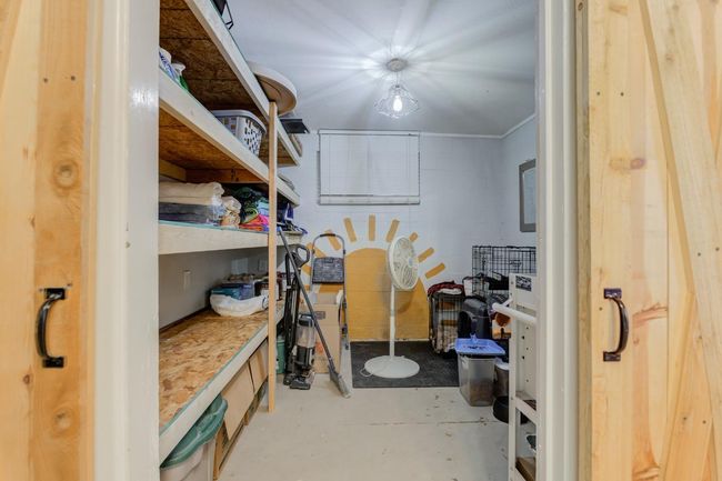Spacious storage area just off the utility room | Image 22