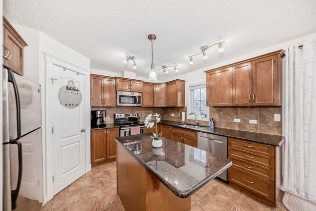 4004 - 2370 Bayside Rd Sw, Home with 3 bedrooms, 2 bathrooms and 2 parking in Airdrie AB | Image 14