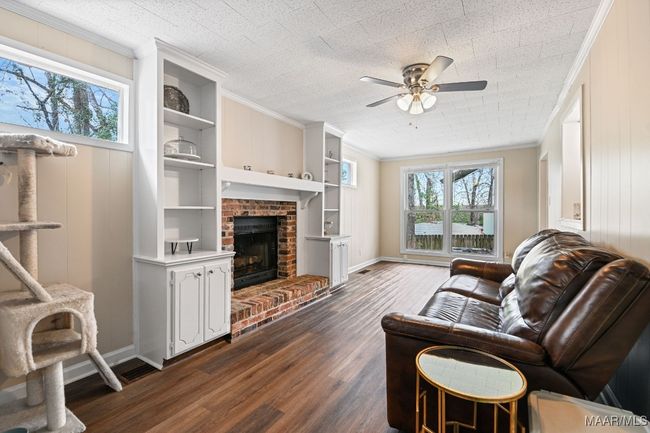 Den with brick fireplace | Image 15