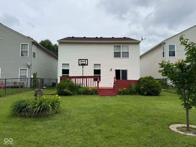 rear view of house featuring a deck | Image 5