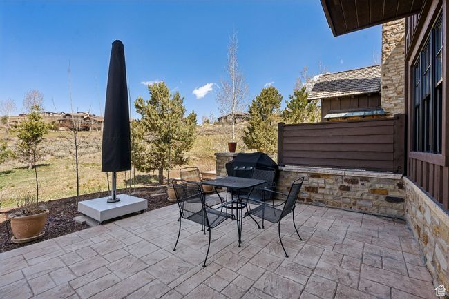 View of patio featuring outdoor dining area | Image 34