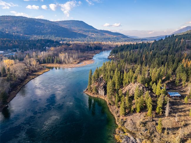 Bird's eye view featuring a water and mountain view | Image 13