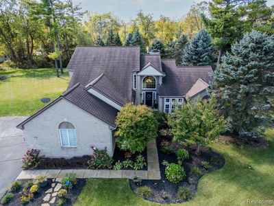 12538 Fall River Drive, Home with 4 bedrooms, 2 bathrooms and null parking in Green Oak Twp MI | Image 1