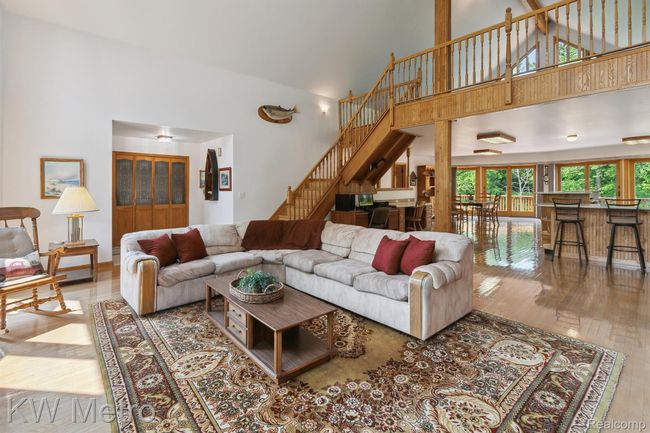 Great Room w/Stairs to Loft | Image 8