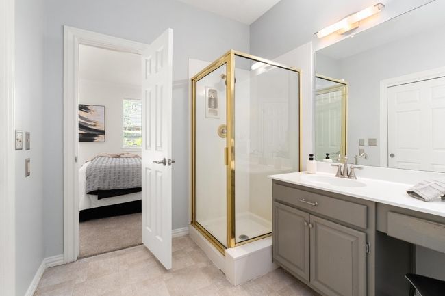 Ensuite bathroom with a shower stall and vanity | Image 17