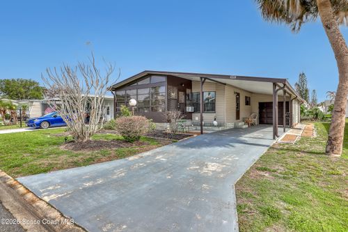 949 Laurel Cir, Barefoot Bay, FL, 32976-7298 | Card Image