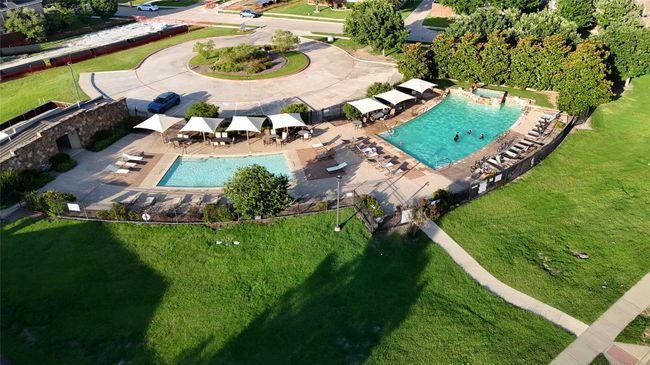 Aerial view of property and surrounding area featuring a pool | Image 37