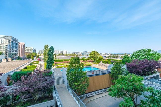 View of swimming pool featuring a city view | Image 22