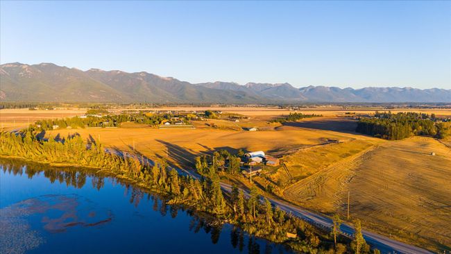 Bird's eye view with a water and mountain view and a rural view | Image 55